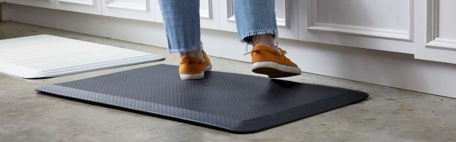 Heavy-duty anti-fatigue matting in industrial workplace